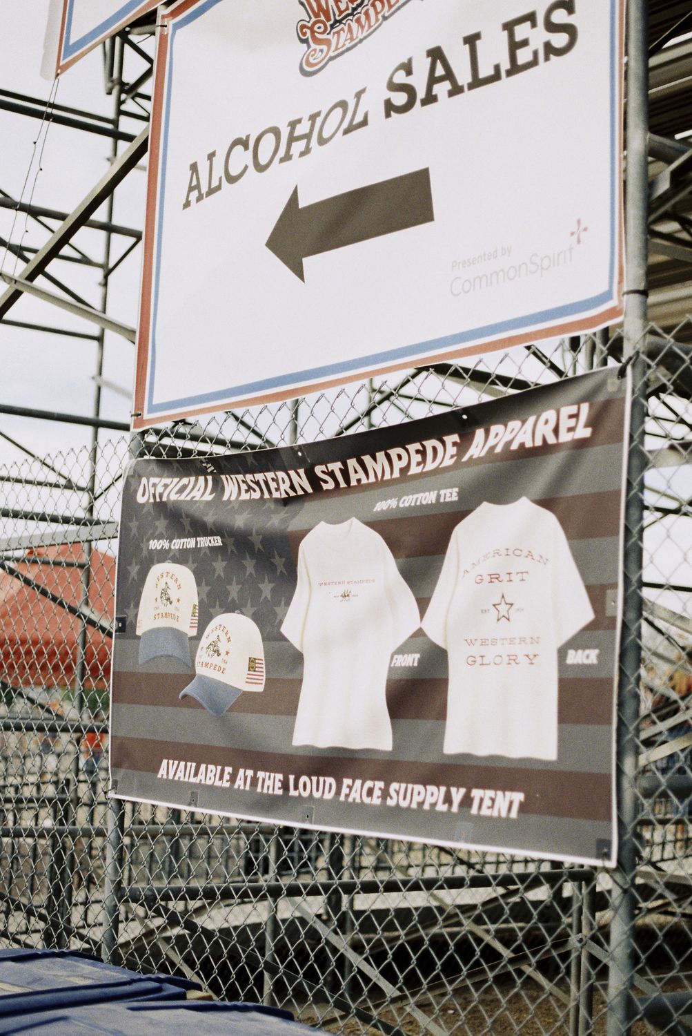 Official Western Stampede Apparel banner at the arena directing fans to the Loud Face Supply tent